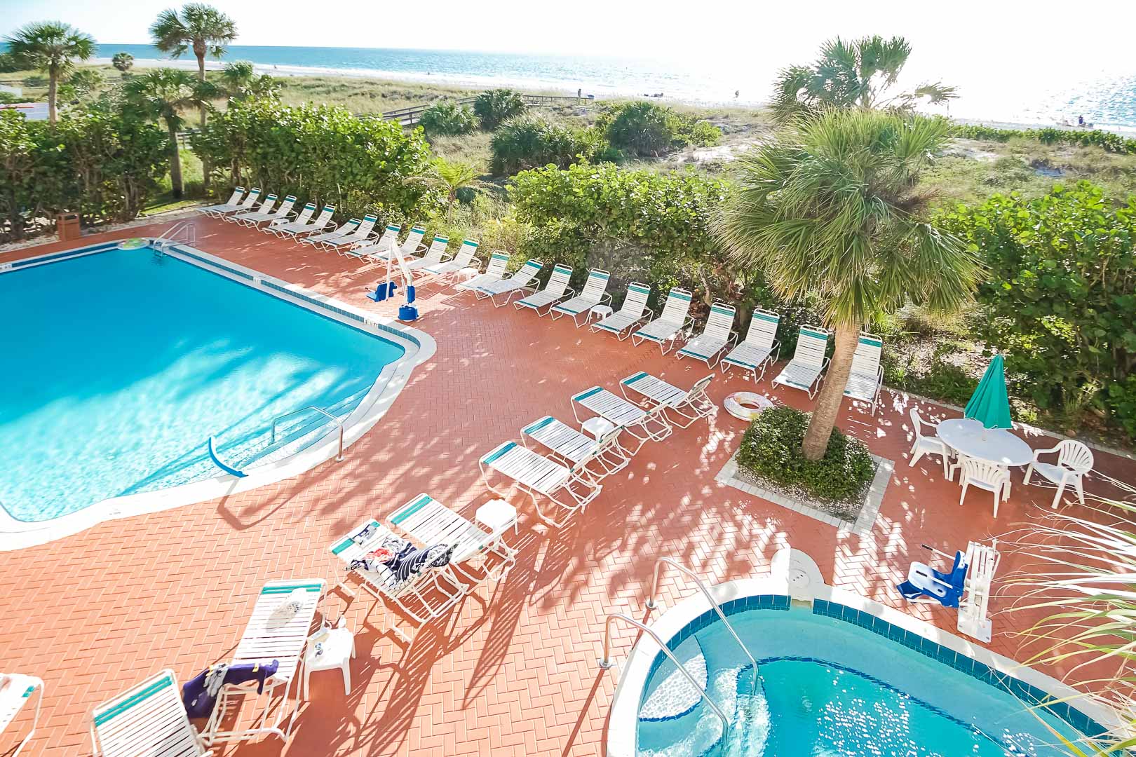 A spacious swimming pool at VRI's Sand Pebble Resort in Treasure Island, Florida.